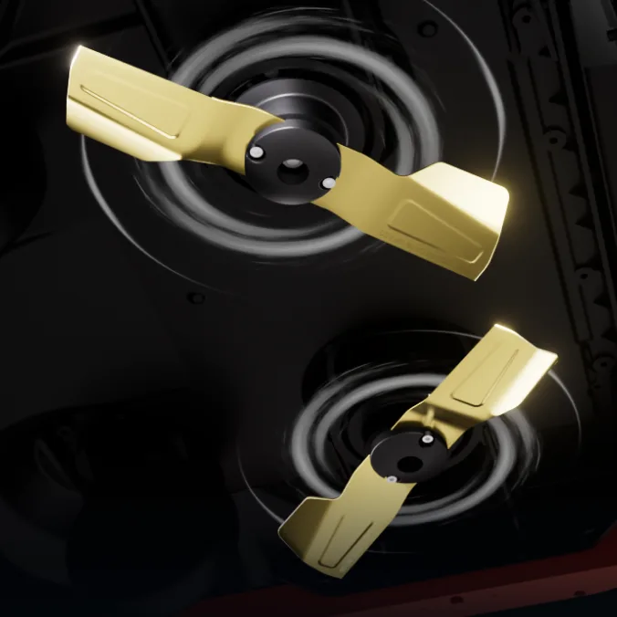 Close-up view of the Yarbo Lawn Mower Pro dual cutting blades spinning beneath the mower deck, showing the gold blades and precision cutting system.