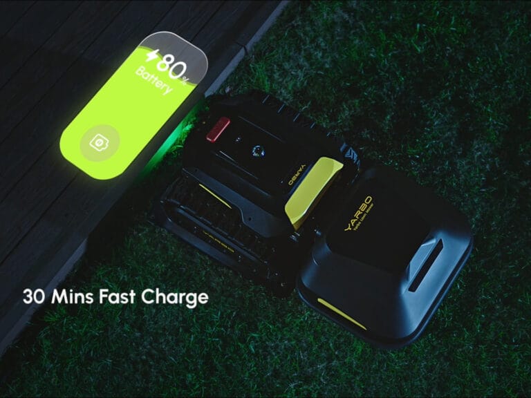 Yarbo M Series robotic lawn mower showing fast-charge battery status during nighttime operation
