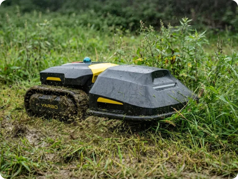 Yarbo M Series robotic lawn mower operating in wet and muddy grass conditions